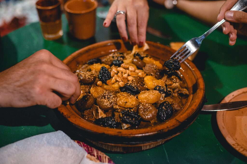 A delicious lamb tagine dish served with prunes and almonds, a traditional Moroccan recipe.