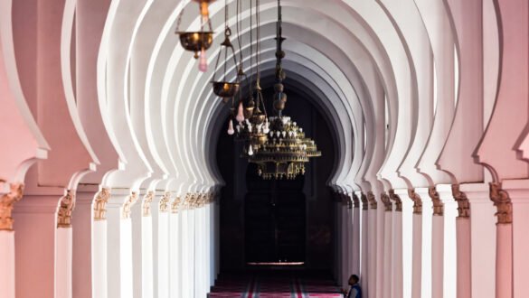 Majestic interior view of the entrance to the Koutoubia Mosque in Marrakech, Morocco, showcasing its spiritual significance.