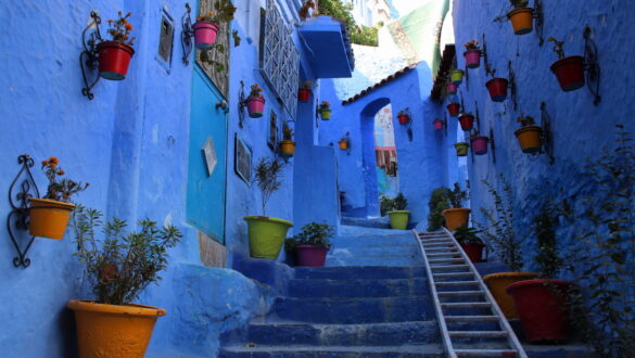 Vibrant blue streets of Chefchaouen, a captivating city in Morocco known for its enchanting charm and vibrant atmosphere.