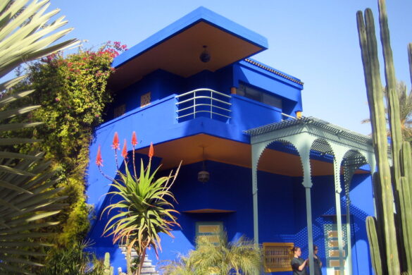 "Photo of Jardin Majorelle or Majorelle Gardens, a botanical garden and tourist attraction inspired by Islamic gardens, featuring approximately 300 species across nearly one hectare in Marrakech, Morocco. The garden also includes a museum showcasing Berber culture. It was founded by French artist Jacques Majorelle (1886-1962) in 1931. Acquired by Yves Saint Laurent and Pierre Bergé in 1980, it is currently owned by the Pierre Bergé - Yves Saint Laurent Foundation and has been designated as a House of the Famous since 2011."