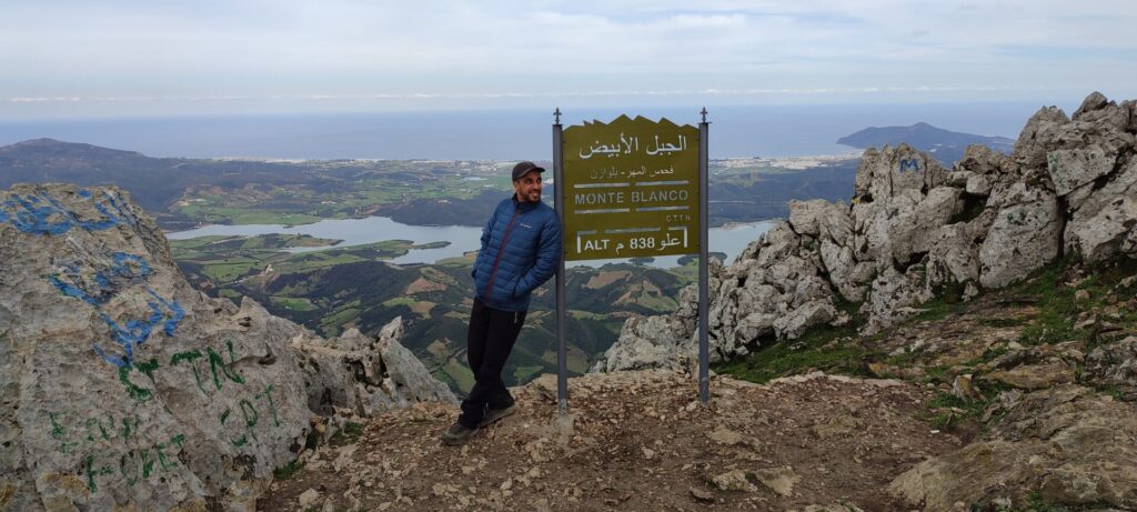 A breathtaking view of the majestic summit Jebel Al-Abiad (Monte Blanco), showcasing its grandeur and beauty amidst the surrounding landscape of Fahs Lmhar.