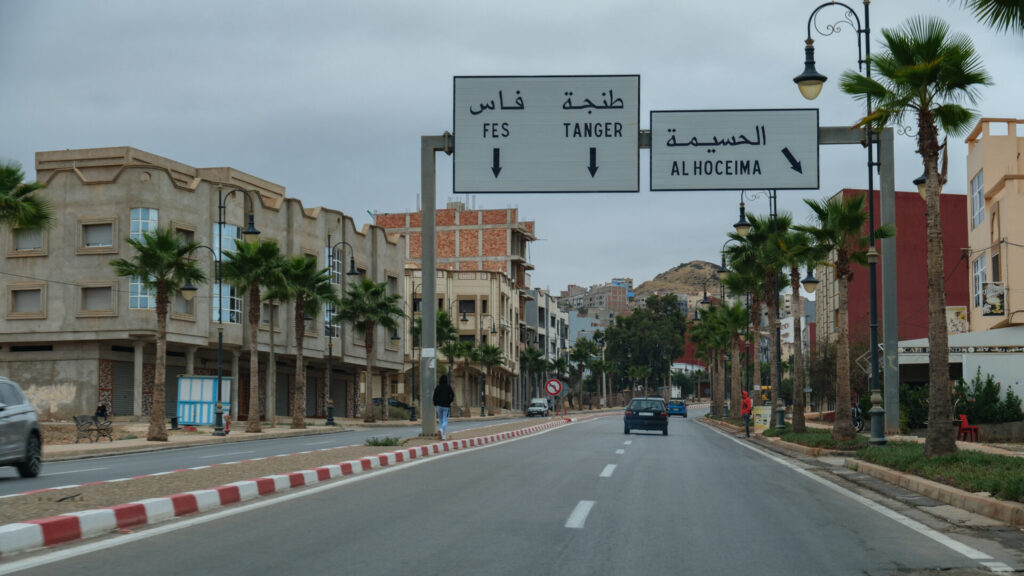 Al Hoceima, Morocco. A small town on the north coast of Morocco, situated along the Mediterranean Sea. The town features a port with ferry services to and from Motril, Spain, as well as a nearby airport. Known for its picturesque beaches and luxurious resorts, including the Radisson Blu hotel, which offers affordable accommodation options