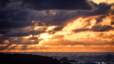 Sunset view over the Atlantic Ocean from the walls of Essaouira, Morocco, showcasing the the temperature in April.